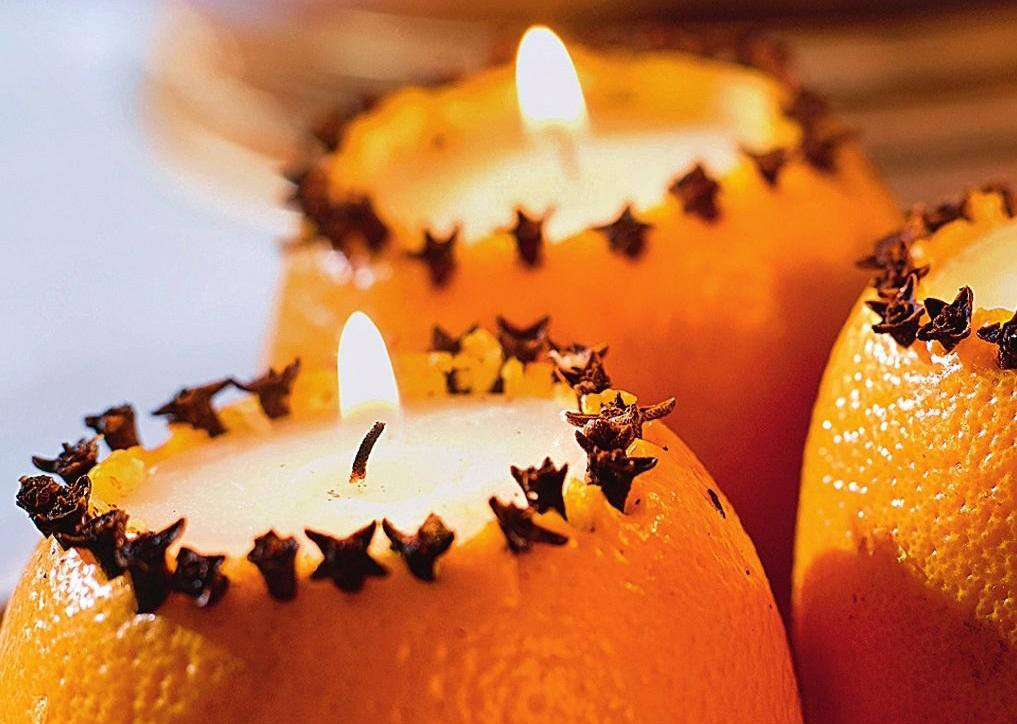Свечи из апельсинов.